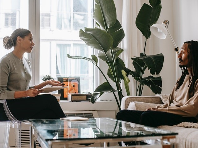 two individials talking